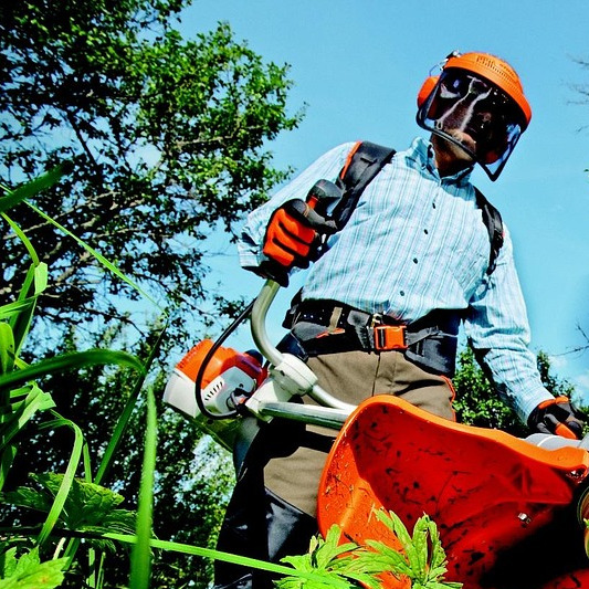 Tough Lawn crew lead at work